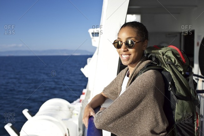 Young woman travelling on a boat