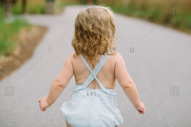 Rear View Of Toddler With Blonde Curly Hair Stock Photo Offset