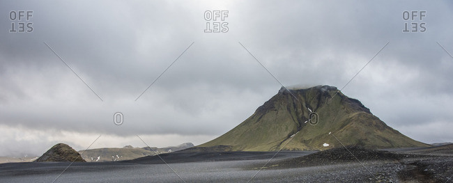 Barren mountaintop under clouds