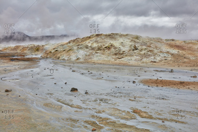 Geothermal steam over Icelandic landscape