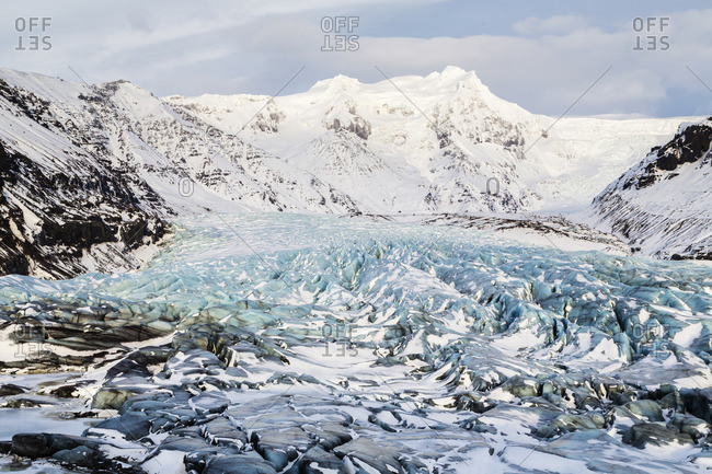Ice on snowy mountain landscape
