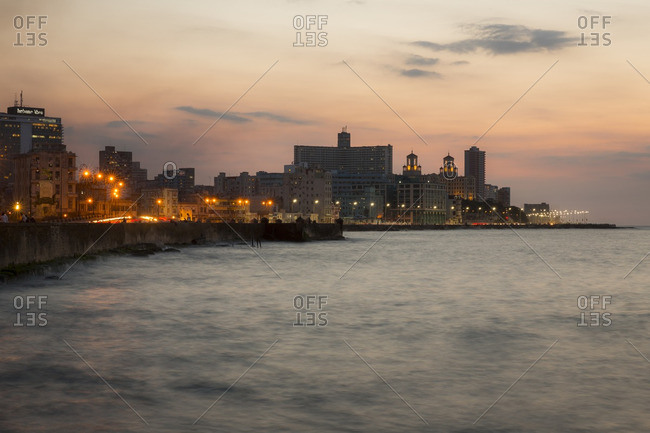 Havana, Cuba - April 30, 2016: The Malecon waterfront at dusk