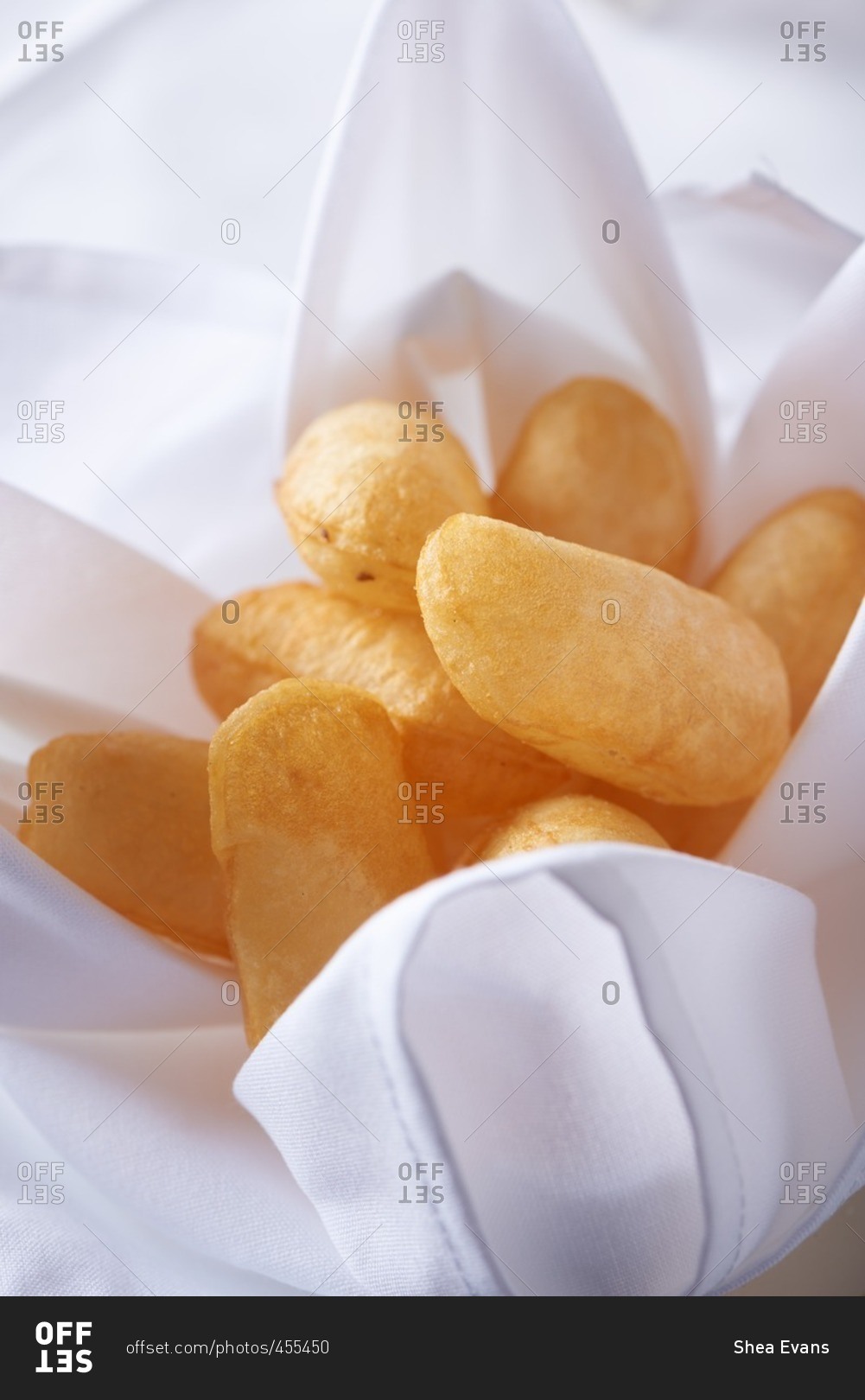 Traditional French fries, Pommes De Terre Souffles, potatoes that have been puffed, hollow on the inside and served hot with sea salt.