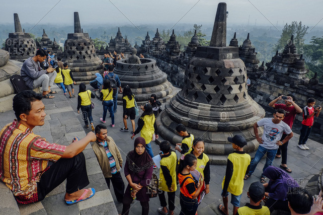 Yogyakarta, Indonesia - January 24, 2016: Thousand of peoples visit Borubudur Temple Compounds