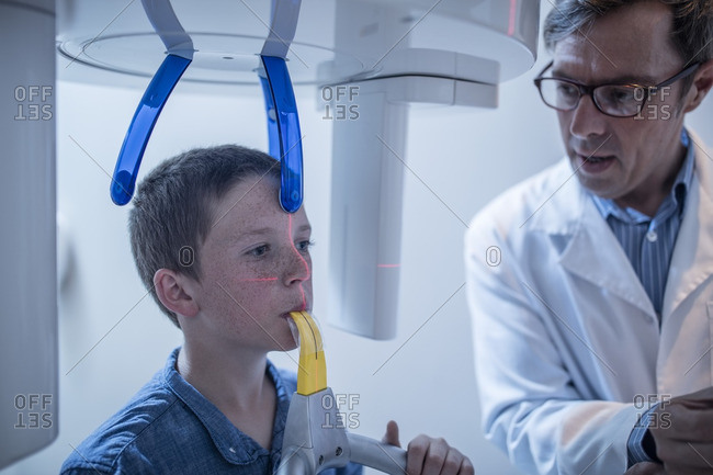 Boy at the dentist in x-ray machine