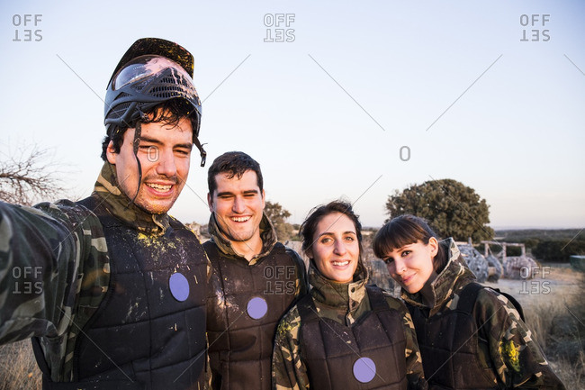 Selfie photo of smiling paintball players