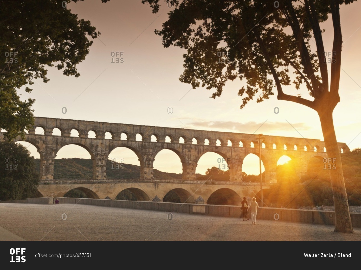 Sun shining through aqueduct