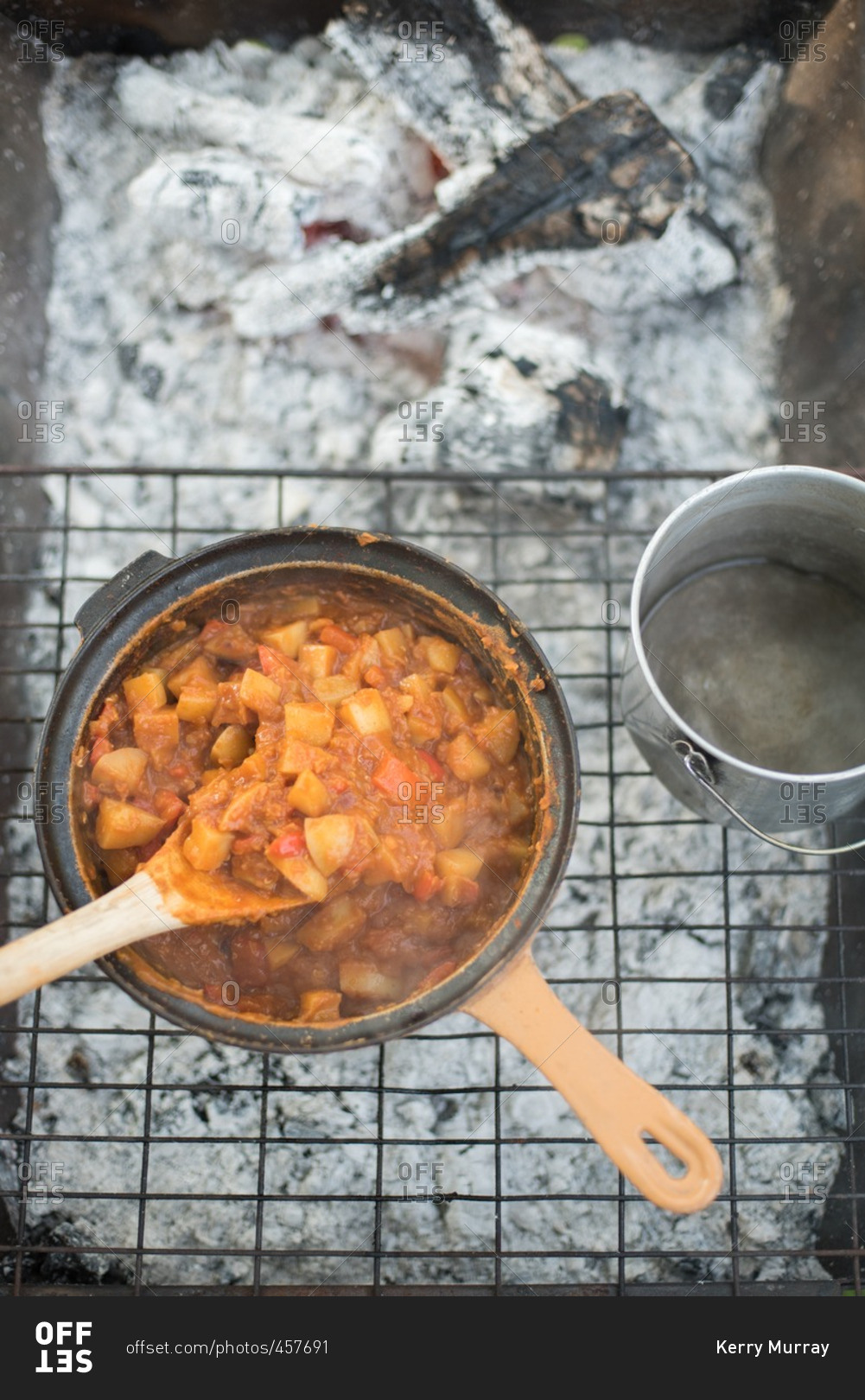 A stew cooking on grill stock photo - OFFSET