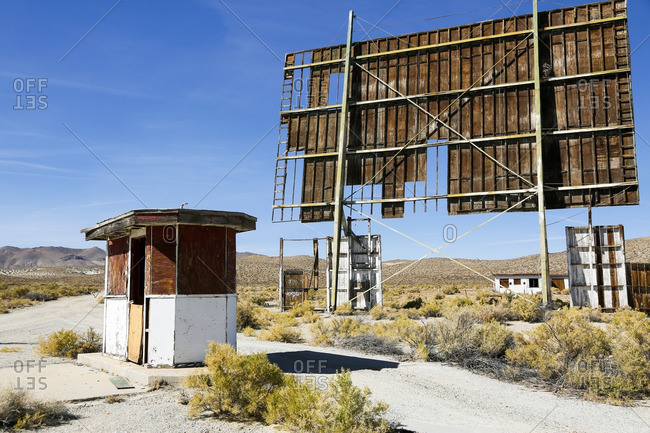 Abandoned drive-in movie theatre in the desert
