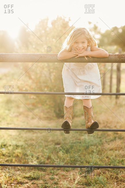 little girl in cowboy boots