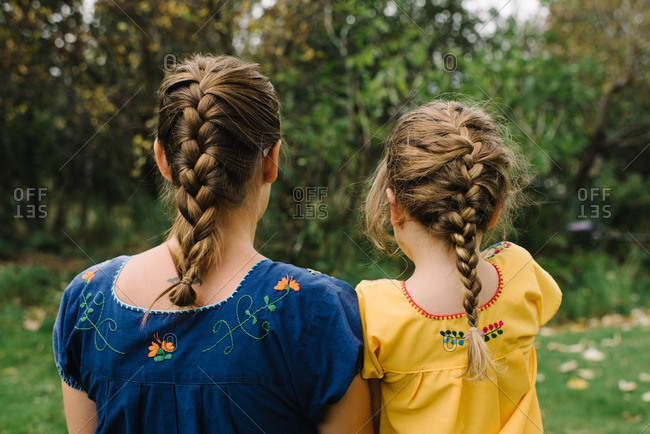 Girl and woman in embroidered shirts