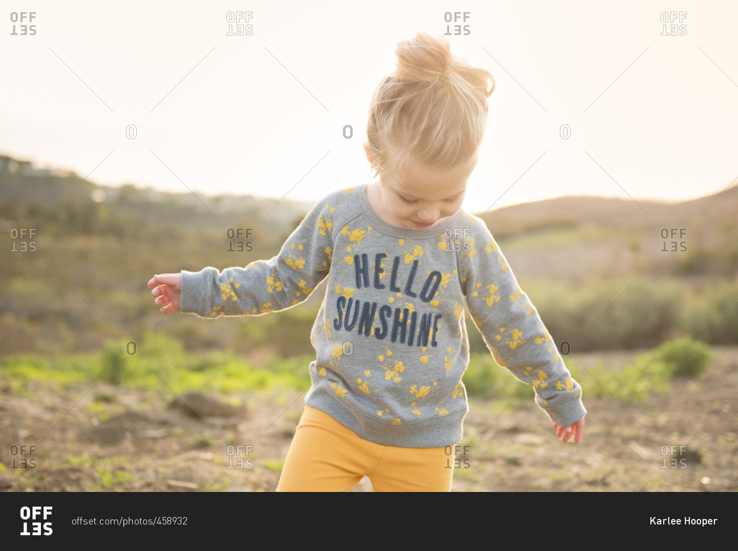 Little girl wearing hello sunshine shirt