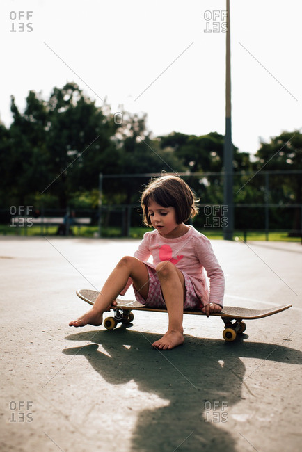 Girl on skateboard in park