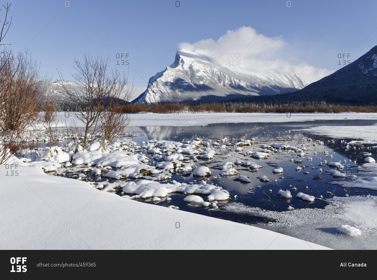 Mount Rundle from Vermilion Lakes.  Hot springs keep parts of Vermilion Lakes ice free even when it is -20 outside, Banff National Park, Alberta, Canada