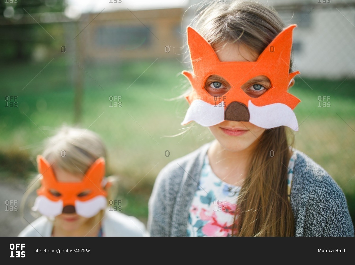 Close up of girls wearing fox masks
