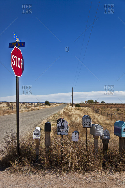 Santa Fe, New Mexico - October 27, 2014: Mail boxes by a stop sign in New Mexico