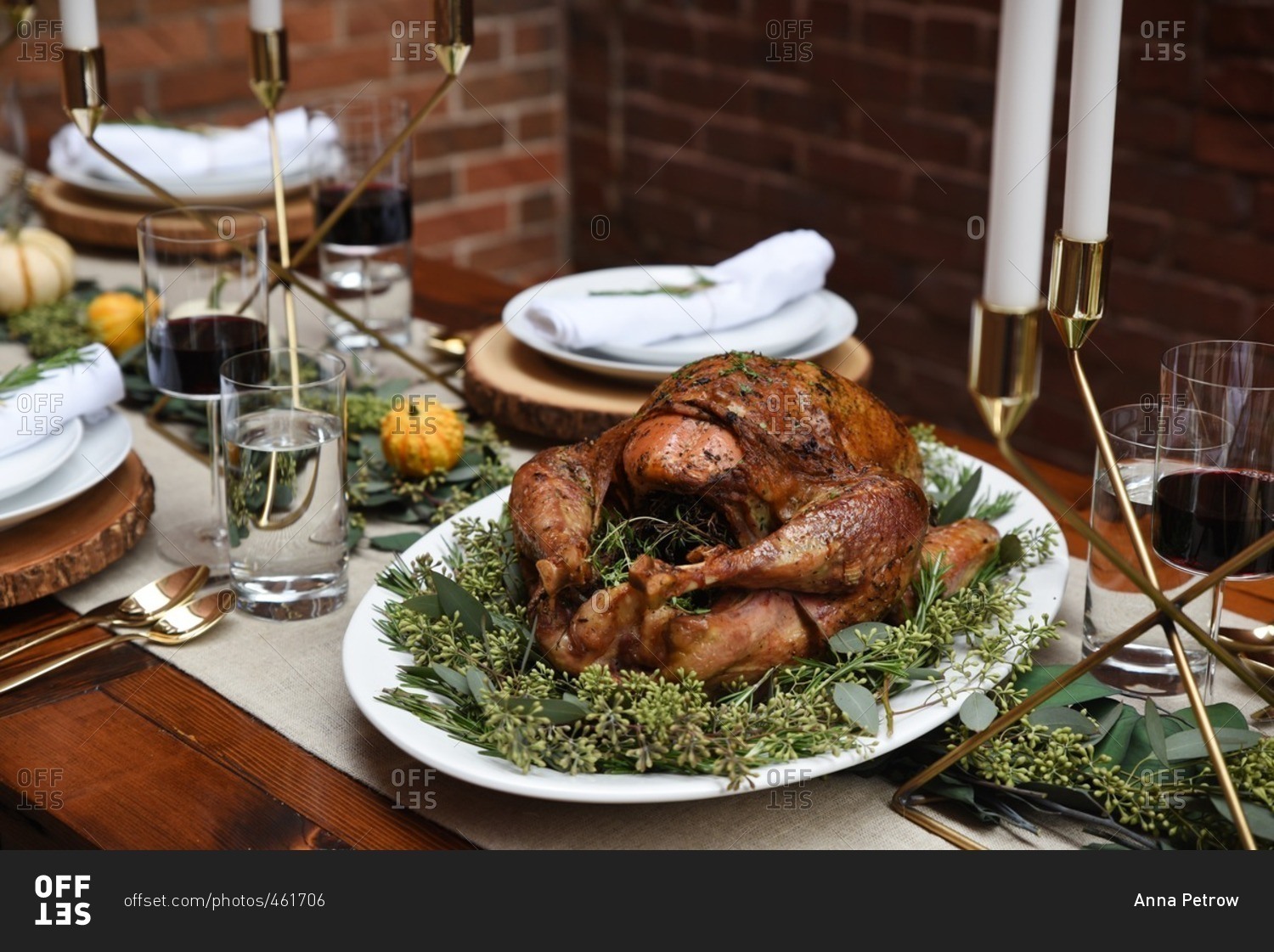 Roasted seasoned turkey on a bed of green garnish