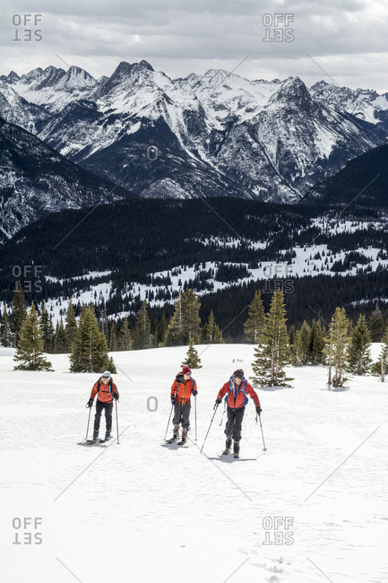 Group of skiers skiing on the Grand Turk in Silverton, Colorado