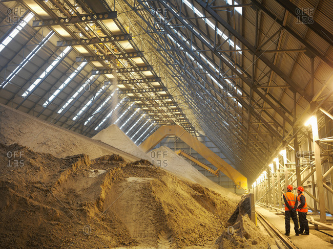 Workers Inspecting Gypsum Store - Offset