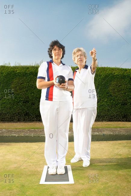 Female Bowlers Discussing Tactics - Offset