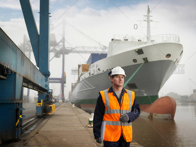 Port Worker With Container Ship