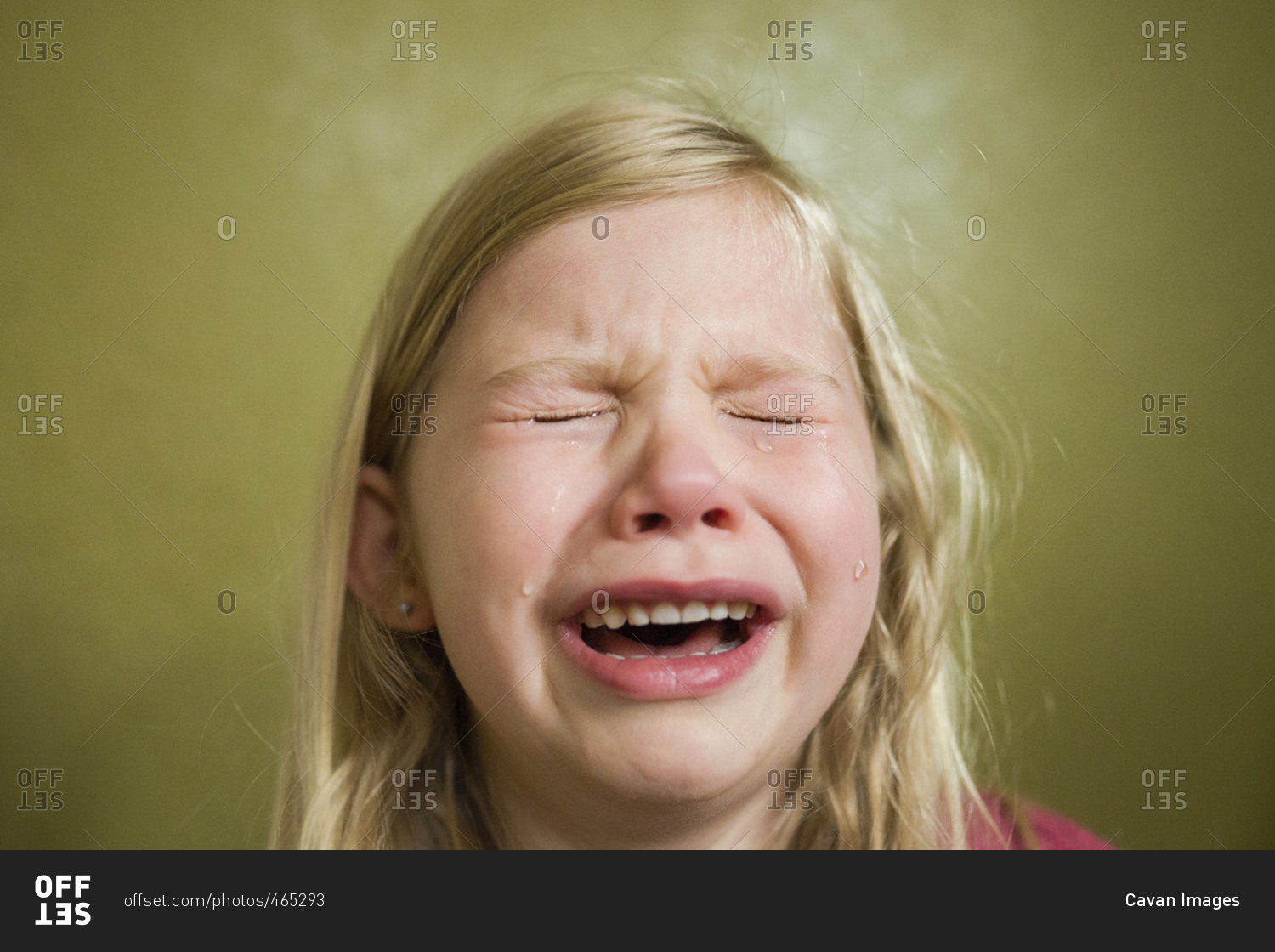 Sad girl crying at home
