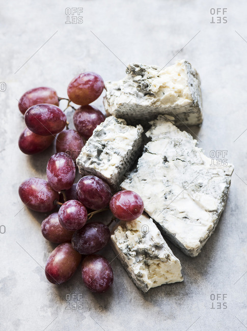 Close up of blue cheese with grapes