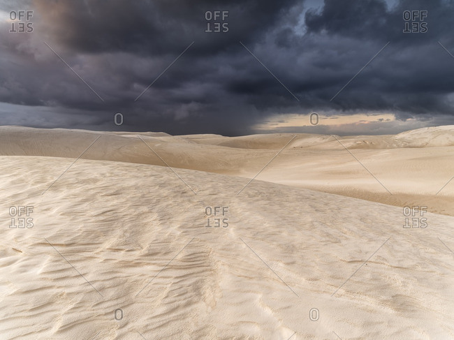 Sand dunes and storm clouds in Western Australia