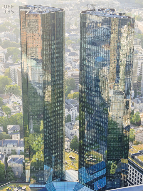 Modern skyscrapers with reflections on facades