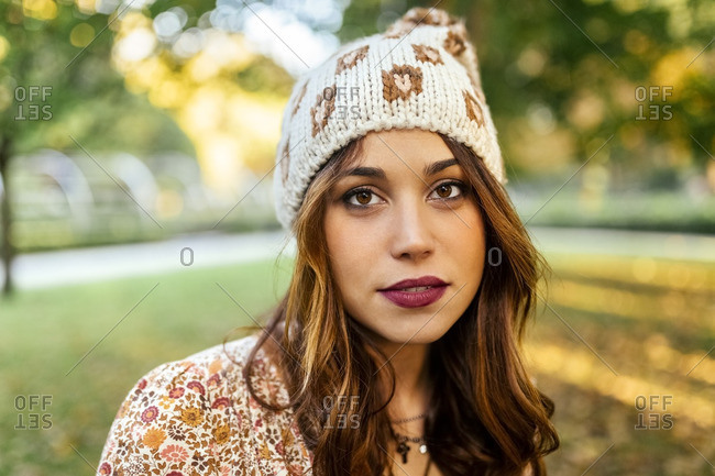 Portrait of young woman wearing wooly hat