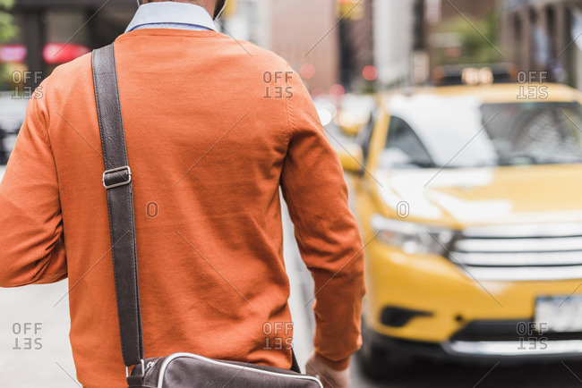 USA- New York City- Businessman approaching cab