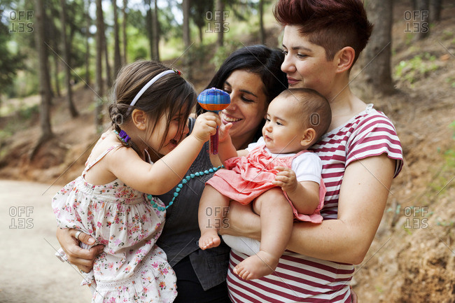Lesbian couple with little daughters
