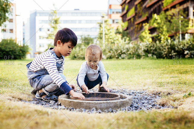 Boys playing together outside
