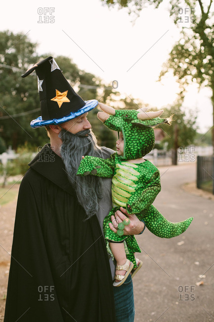 Man and baby in costumes together