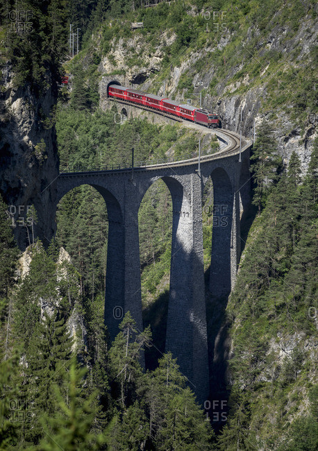 Train on mountain bridge, Filisur, Canton Graubunden, Switzerland