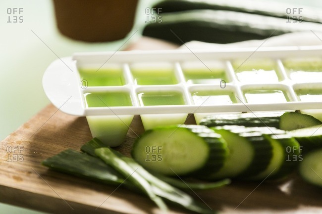 Cucumber aloe vera juice to be frozen in ice cube tray for treating sunburn