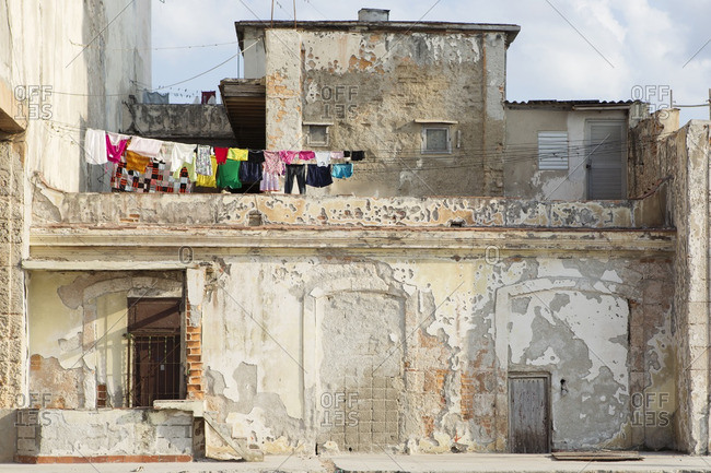 Laundry hanging outside an old dilapidated building in Havana, Cuba