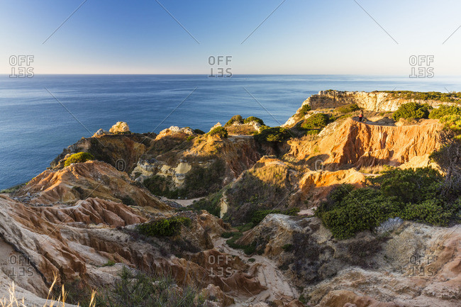 Rock formations and eroding landscape at Praia da Marinha, Lagoa, Portugal
