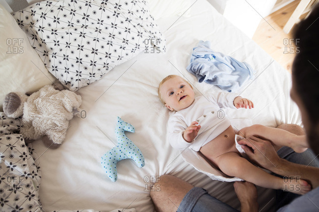 Baby boy in diaper фотография Stock