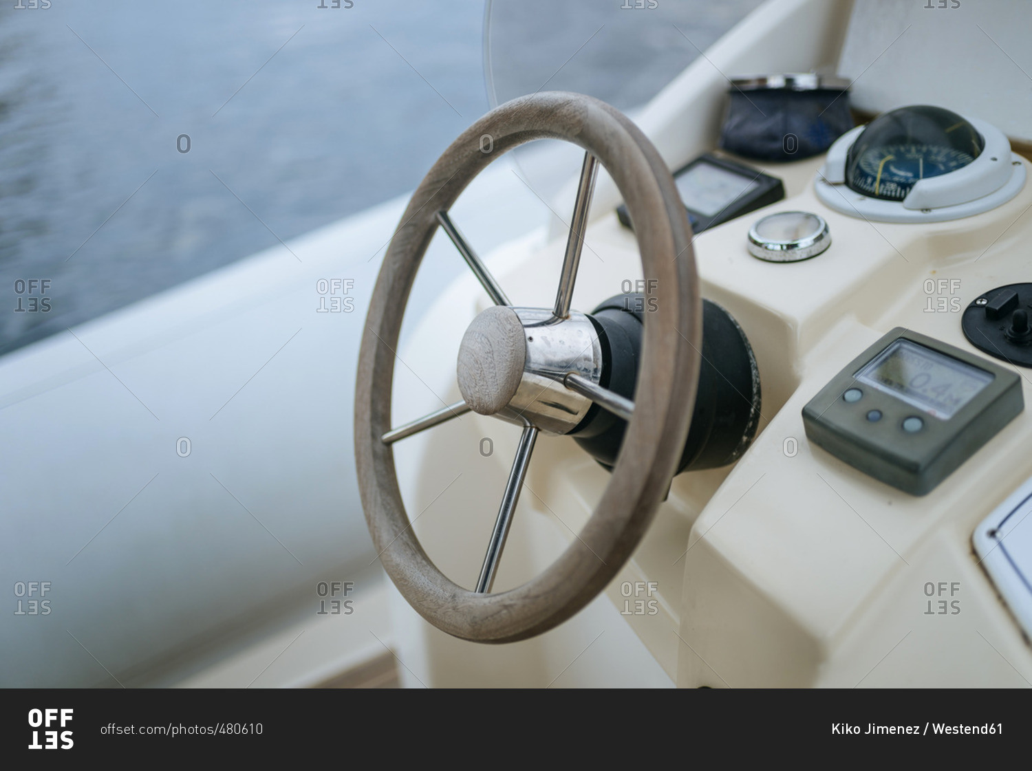Steering wheel of motor boat stock photo OFFSET
