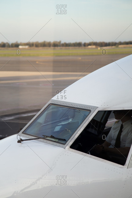 December 22, 2016: Pilot in the cockpit of an airplane on a runway