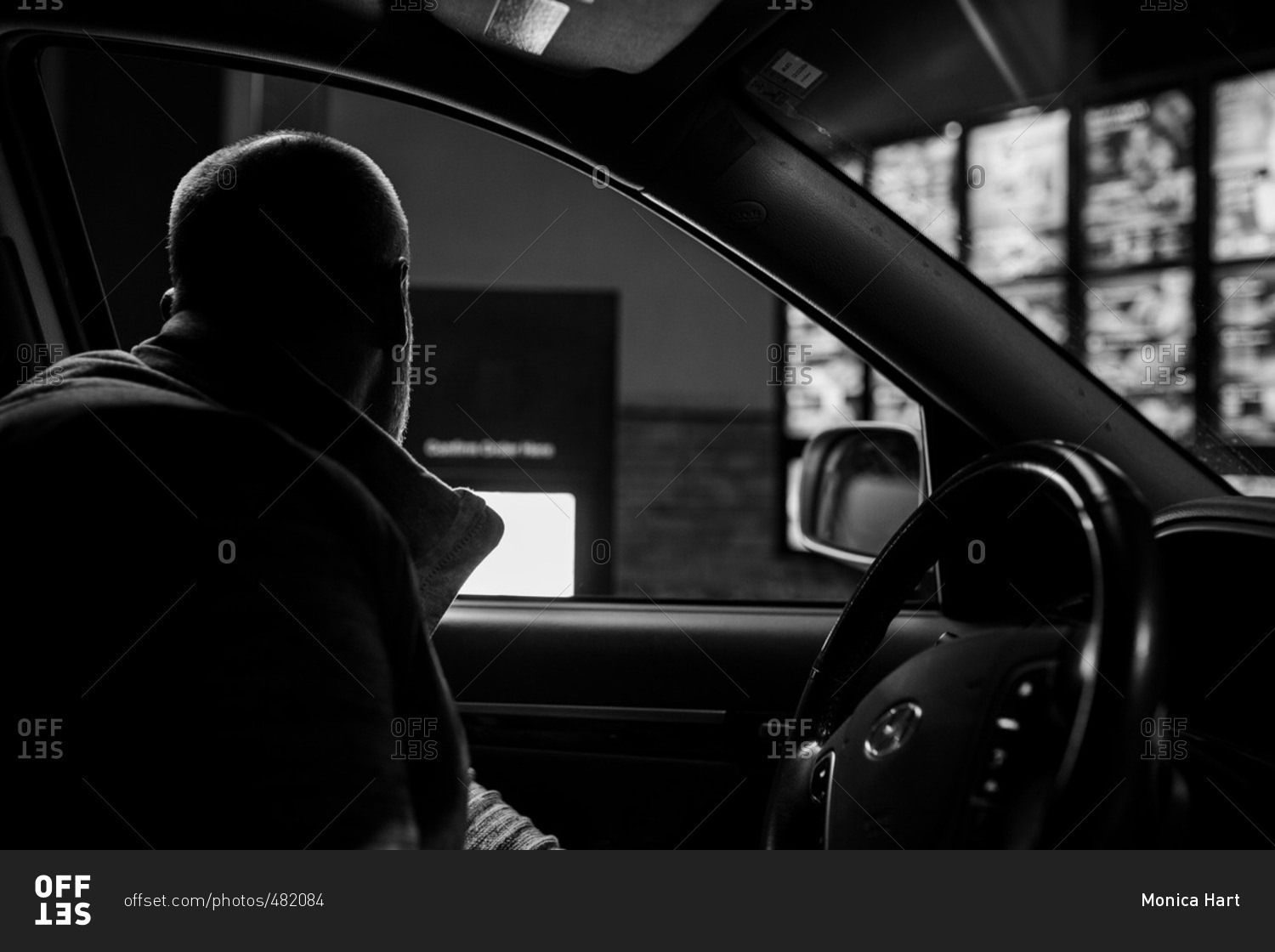 man-in-car-ordering-fast-food-stock-photo-offset