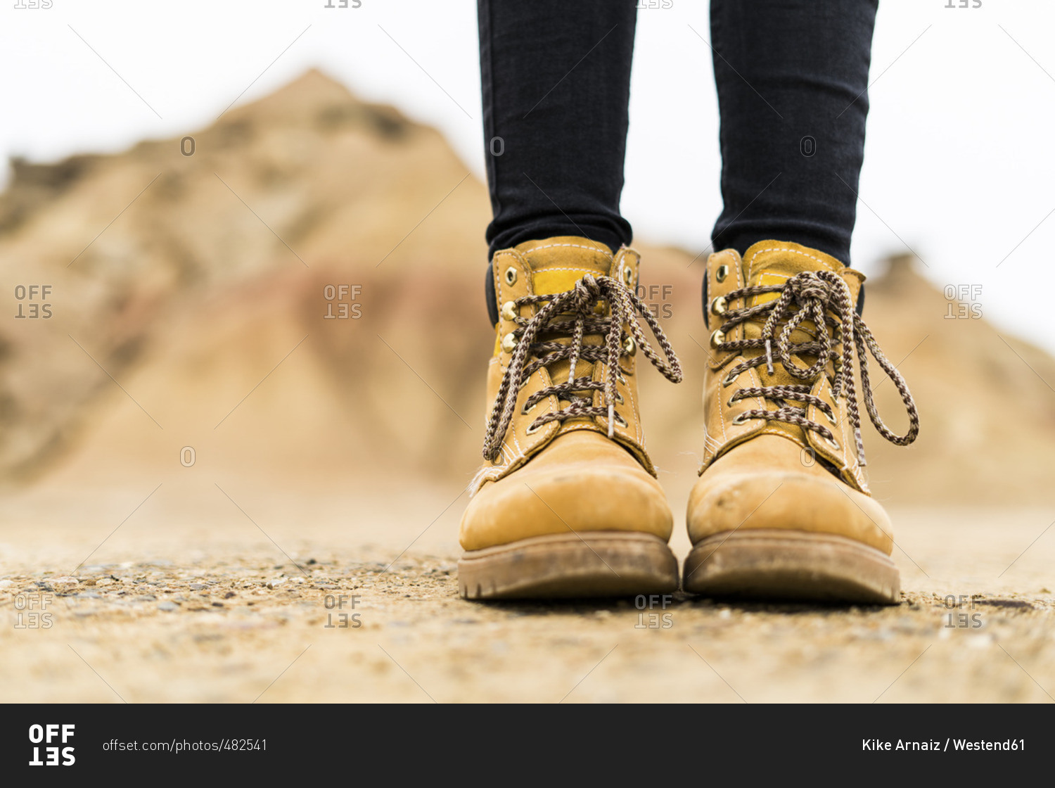 Spain- Navarra- Bardenas Reales- hiking shoes of young woman in nature park- close-up