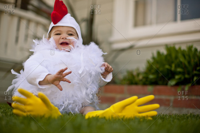 Baby boy wearing a chicken costume