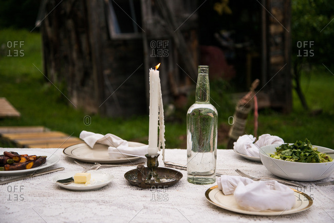 A rustic dinner table in rural setting