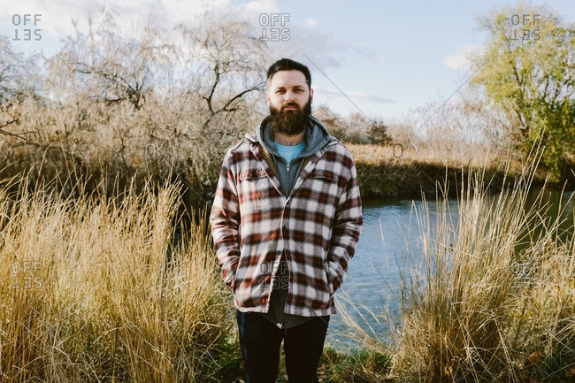 Man in flannel in rural setting