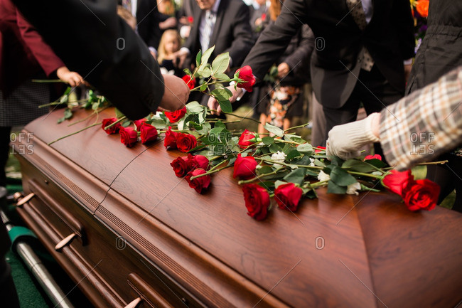 Hand On Casket stock photos - OFFSET