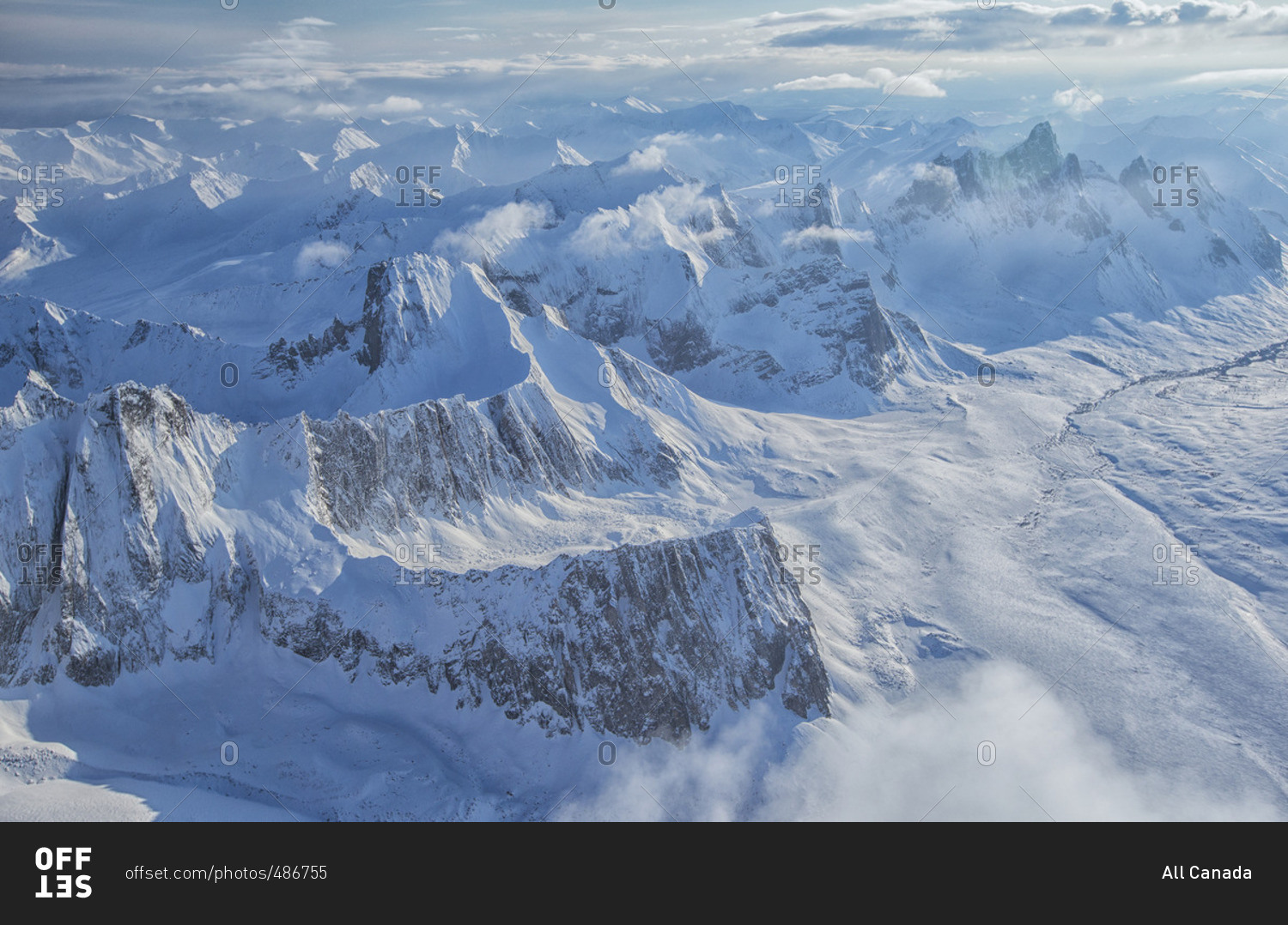Aerial view of the Ogilvie Mountains in Tombstone Territorial Park, Yukon. Snow covered mountains are seen up the north Klondike Valley