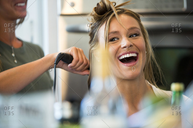 Caucasian Woman Smiling With Hair Stylist Stock Photo Offset