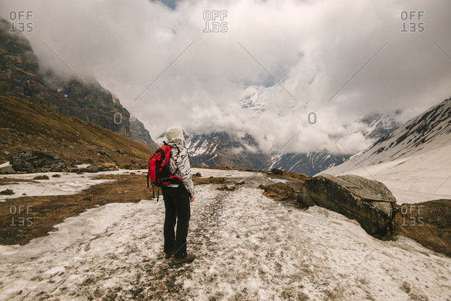 Woman, standing, looking at view,  rear view, ABC trek (Annapurna Base Camp trek), Nepal